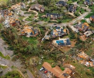 Aerial view of a residential neighborhood with widespread tornado damage